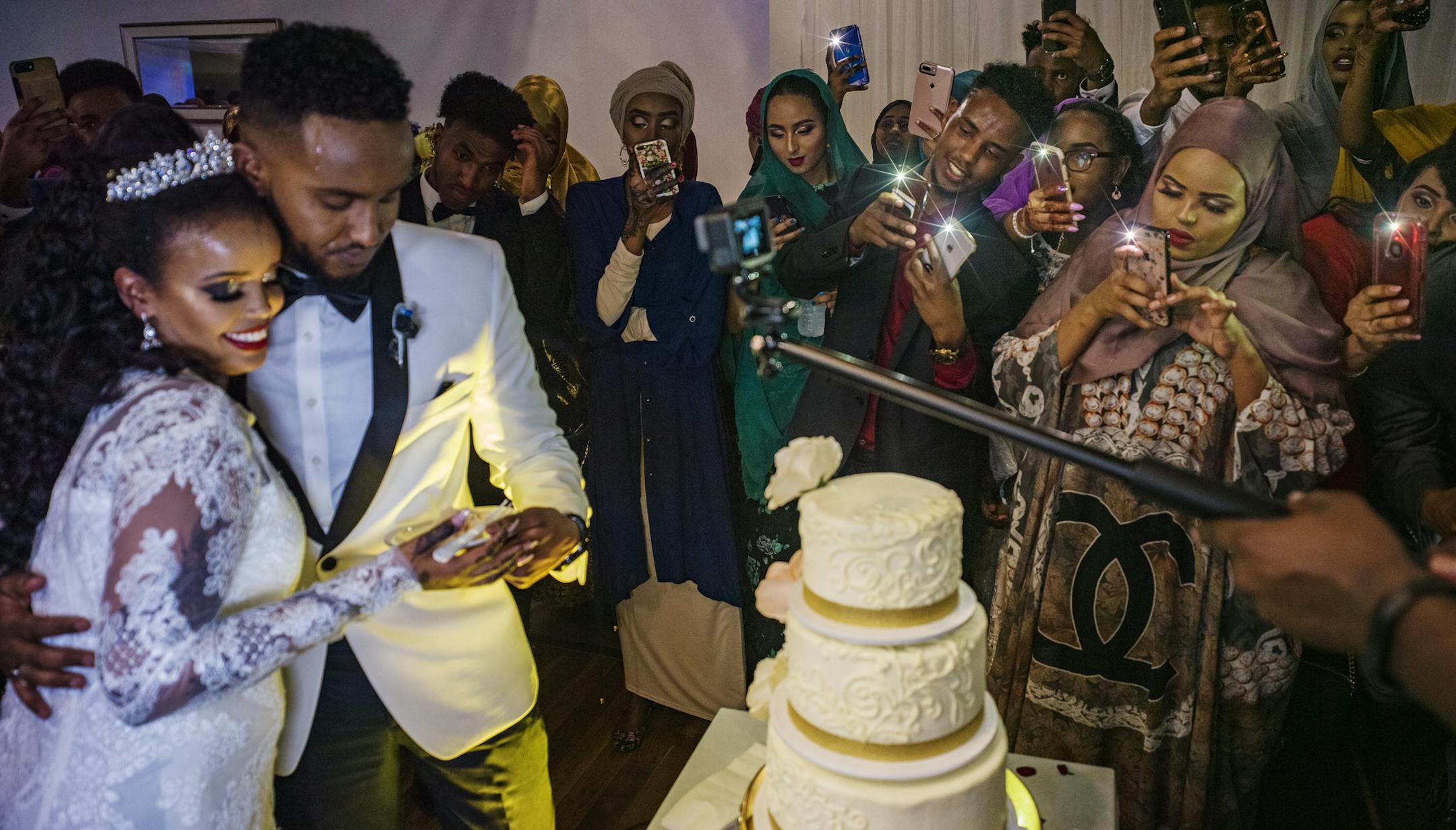 The handsome couple of Habib Abdi and Nafisa Mohamed fed each other some wedding cake before heading to the dance floor. ] The Somali wedding of between Habib Abdi and Nafisa Mohamed took place at the Safari Center with several hundred people in attendance till 4 in the morning.RICHARD TSONG-TAATARII ¥ richard.tsong-taatarii@startribune.com