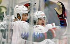 Cole Caufield, right, of the United States celebrated his game-winning goal with teammate K'Andre Miller during the 2020 IIHF World Junior Ice Hockey 