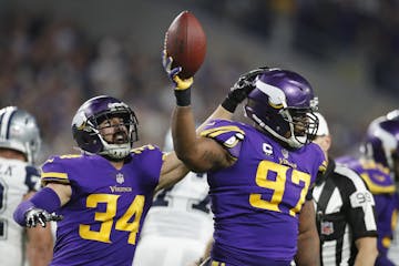 Minnesota Vikings strong safety Andrew Sendejo (34) celebrated defensive end Everson Griffen's (97) fumble recovery last season vs. Dallas.