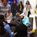 Tiyana Jordan, 14, of Columbia Heights, and Curtis Fortune, 18, of St. Louis Park take a nap together on Black Friday at Mall of America in Bloomingto