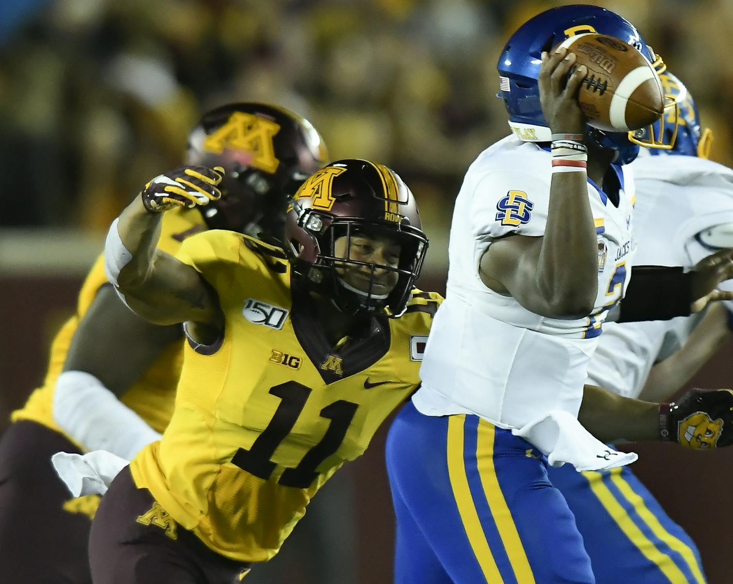 Minnesota Gophers defensive back Antoine Winfield Jr. (11) tackled South Dakota State Jackrabbits quarterback J'Bore Gibbs (2) as he let off the pass that would be intercepted by defensive back Chris Williamson (6) for a touchdown in the third quarter Thursday night. ] Aaron Lavinsky &#x2022; aaron.lavinsky@startribune.com The Minnesota Gophers played South Dakota State Jackrabbits on Thursday, Aug. 29, 2019 at TCF Bank Stadium in Minneapolis, Minn.