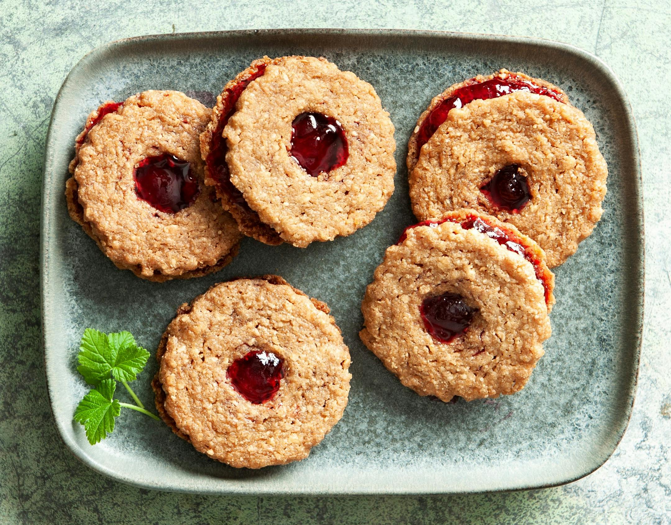 Linzer cookies offer a bright spot as we look forward to warmer days ahead. Recipe by Beth Dooley, photo by Mette Nielsen, Special to the Star Tribune