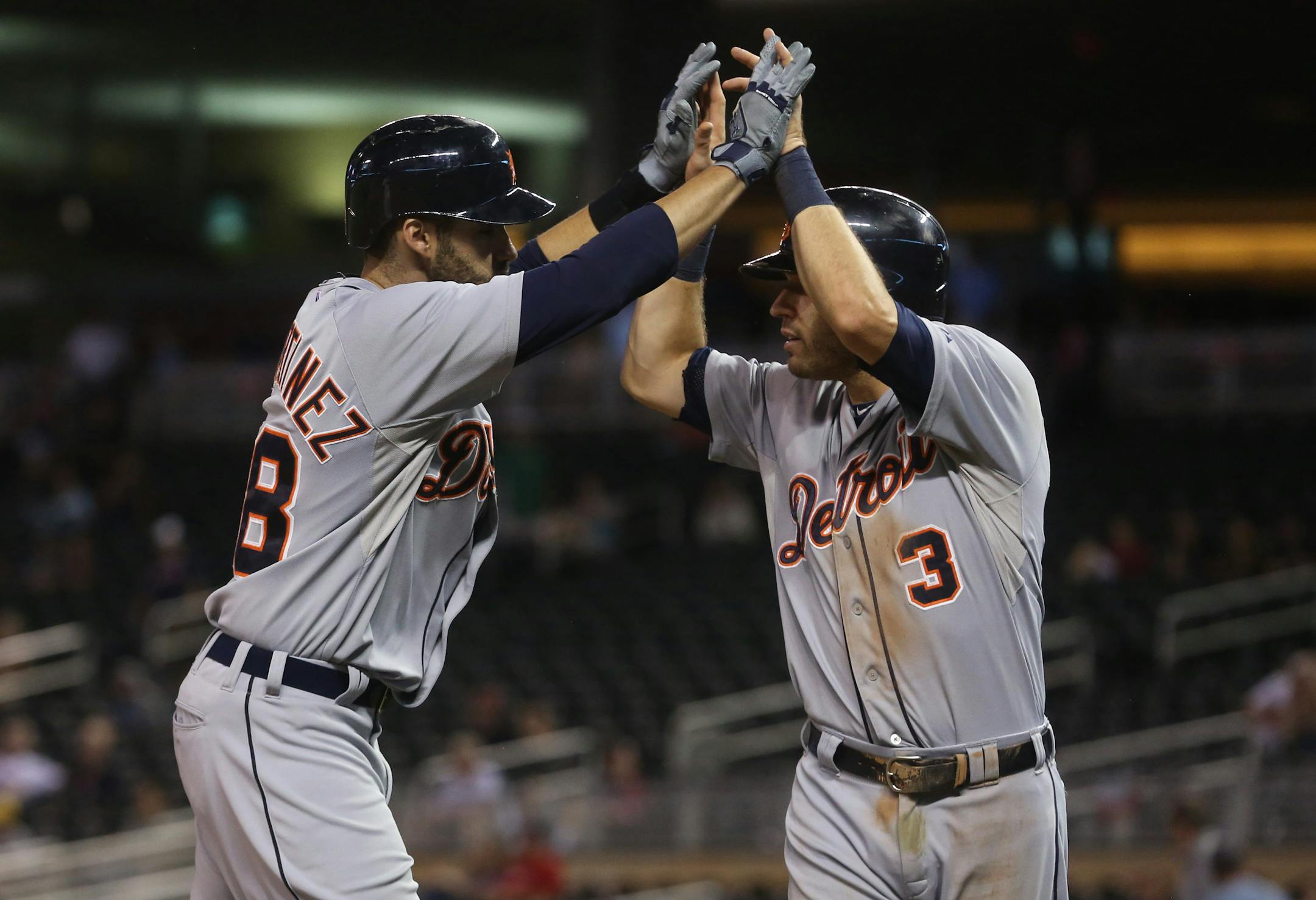 Detroit's Ian Kinsler, right, and J. D. Martinez celebrated after Martinez hit a two-run home run in the 12th inning.