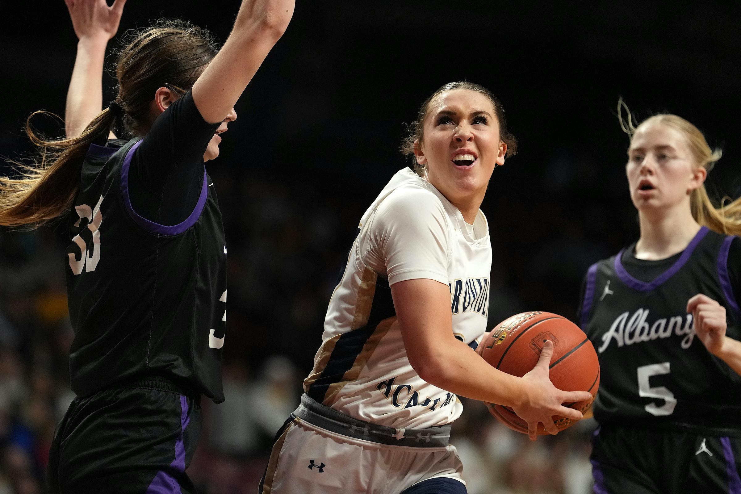 Maddyn Greenway of Providence Academy joins the swelling crowd in the 4,000-point girls basketball club