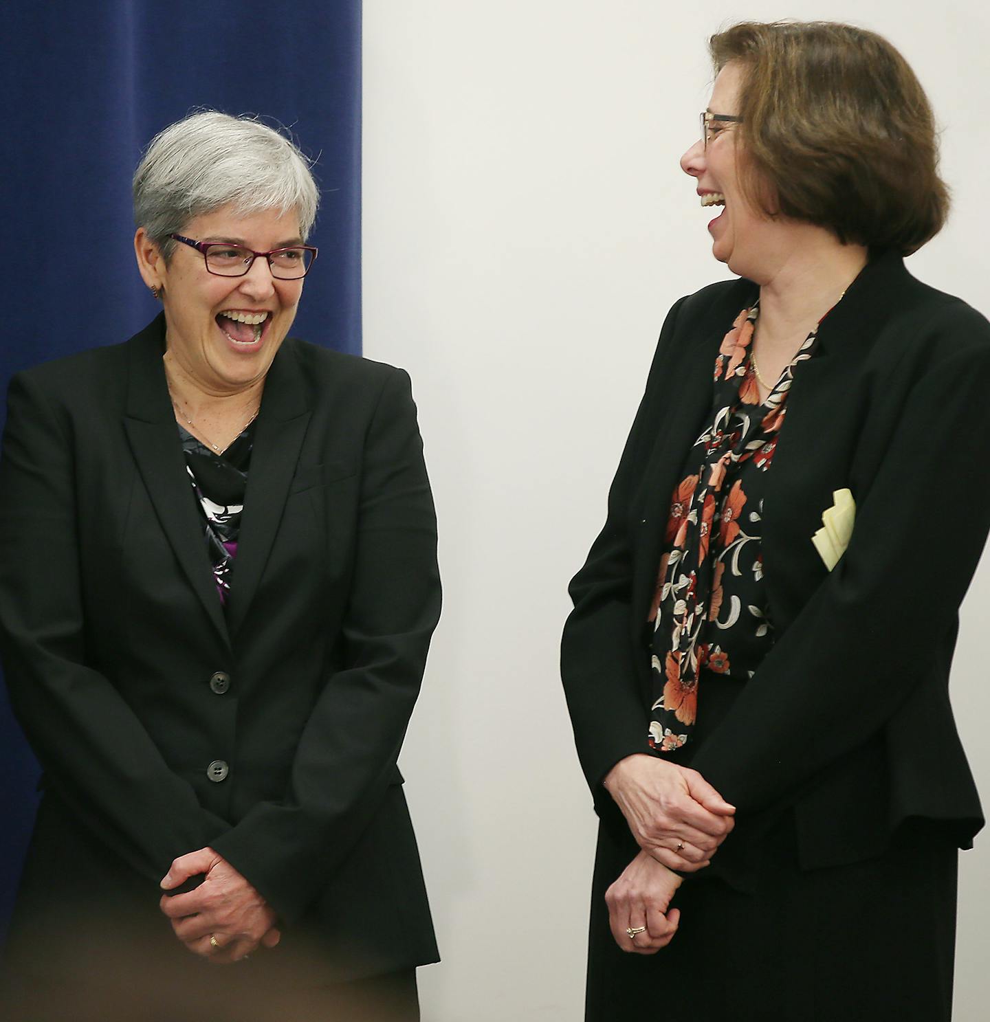 The honorable Judge Margaret Chutich, left, and the Honorable Diane B. Bratvold shared a laugh while being introduced by Governor Mark Dayton during a press conference, Friday, January 22, 2016 at the Veterans Services Building in St. Paul, MN. Judge Church was appointed as the Associate Justice of the Minnesota Supreme Court and Judge Bratvold was appointed as Judge of the Minnesota Court of Appeals. ] (ELIZABETH FLORES/STAR TRIBUNE) ELIZABETH FLORES &#x2022; eflores@startribune.com