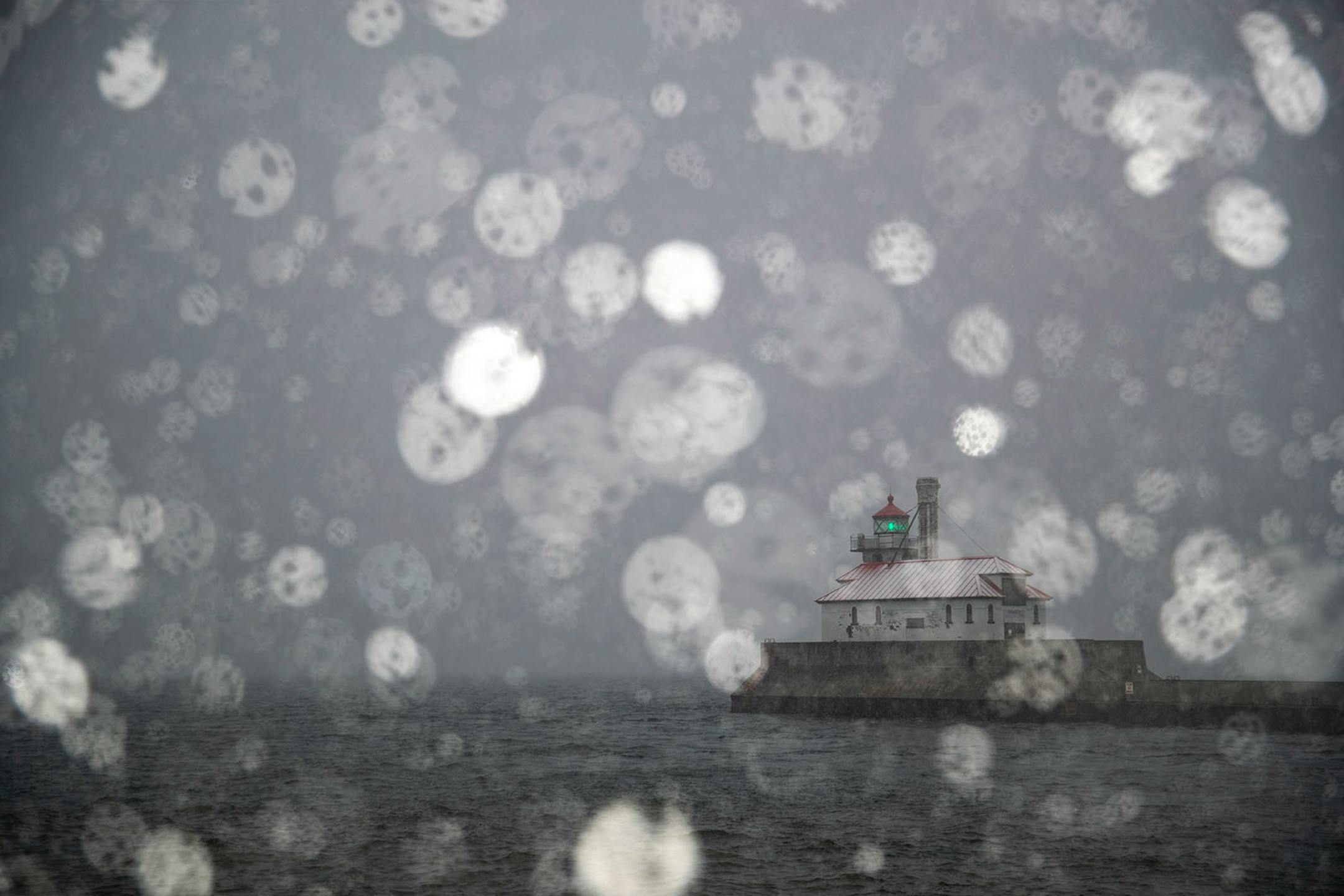 An early snow storm dropped 4-6 inches of snow on Duluth on Tuesday afternoon, including at the South Breakwater Lighthouse.