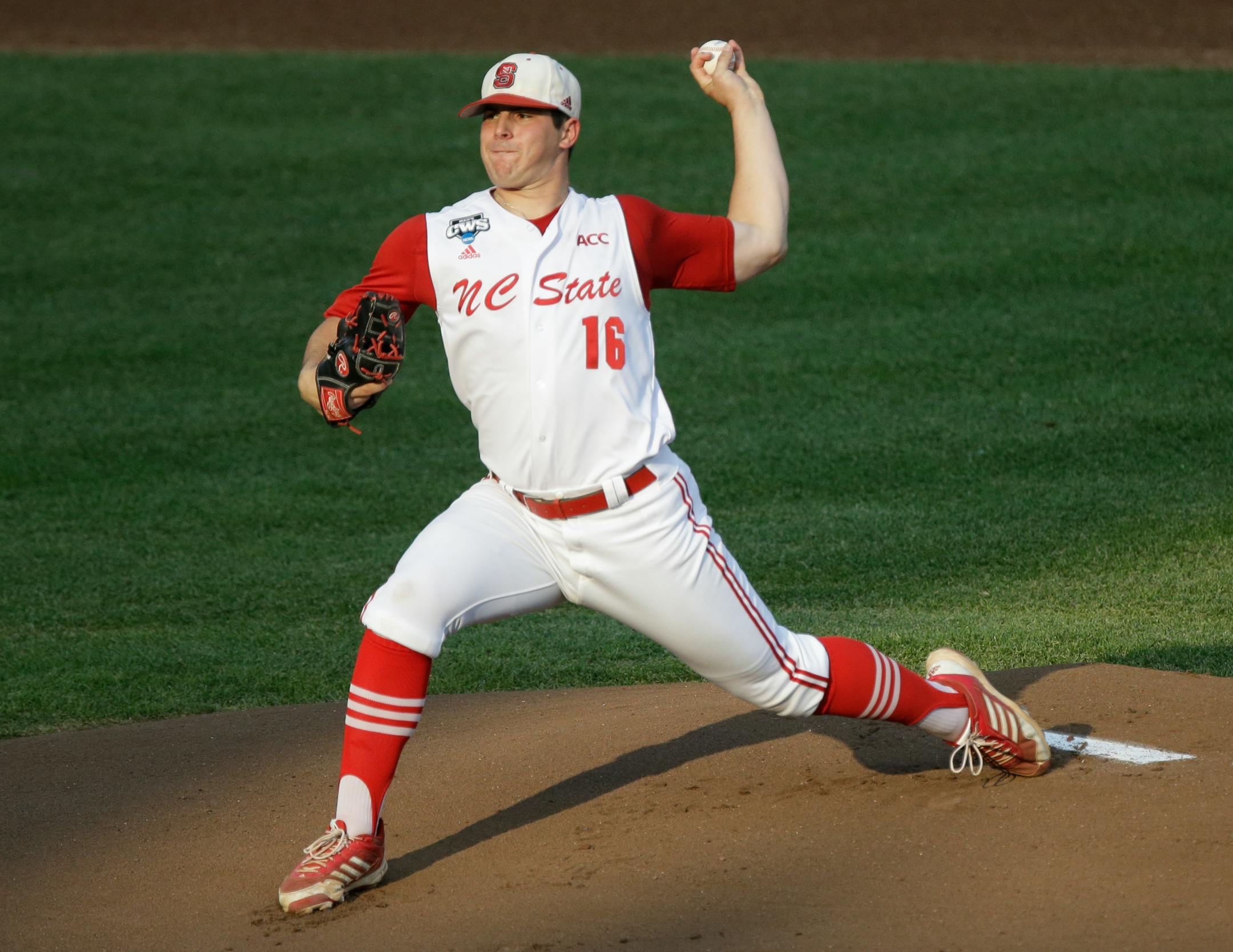 FILE - In this June 20, 2013 file photo, North Carolina State pitcher Carlos Rodon throws against North Carolina during an NCAA College World Series elimination baseball game in Omaha, Neb. (AP Photo/Nati Harnik, File)
