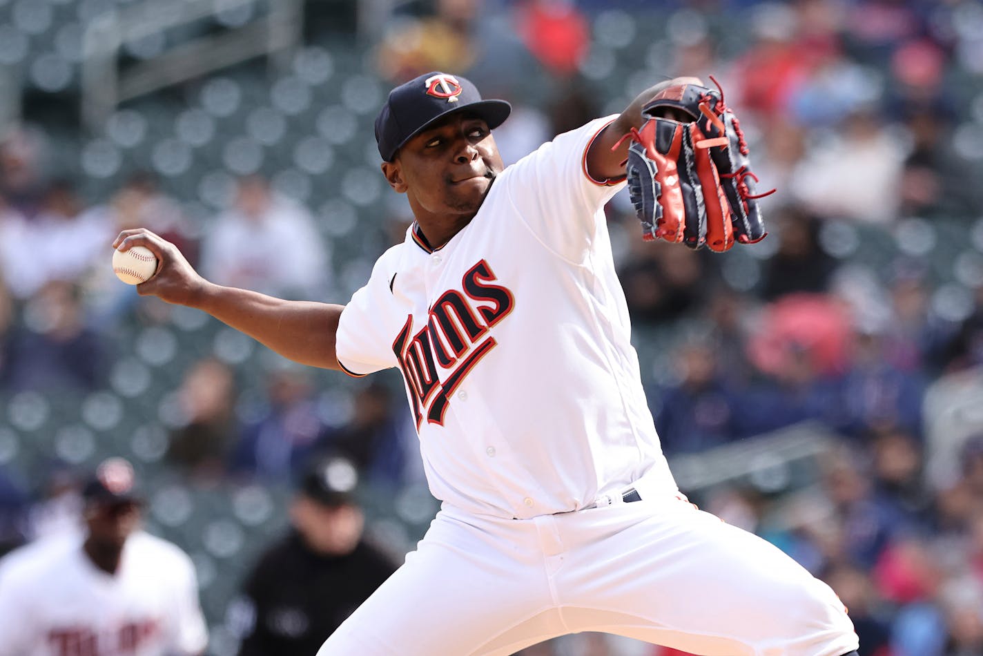 Minnesota Twins relief pitcher Jharel Cotton (45) throws during the eighth inning of a baseball game against the Seattle Mariners, Saturday, April 9, 2022, in Minneapolis. Seattle won 4-3. (AP Photo/Stacy Bengs) ORG XMIT: MERf969218ed48f9939f9494ca9d052b