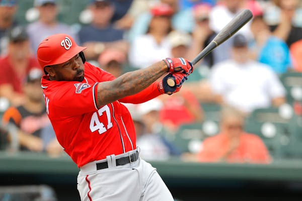 Designated hitters, like Howie Kendrick, will be used in National League games this season.