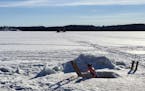 A winter tradition at Camp du Nord in Ely, Minn., involves avantouinti -- the Finnish word for "ice hole swimming." After sitting in a 200-degree log 