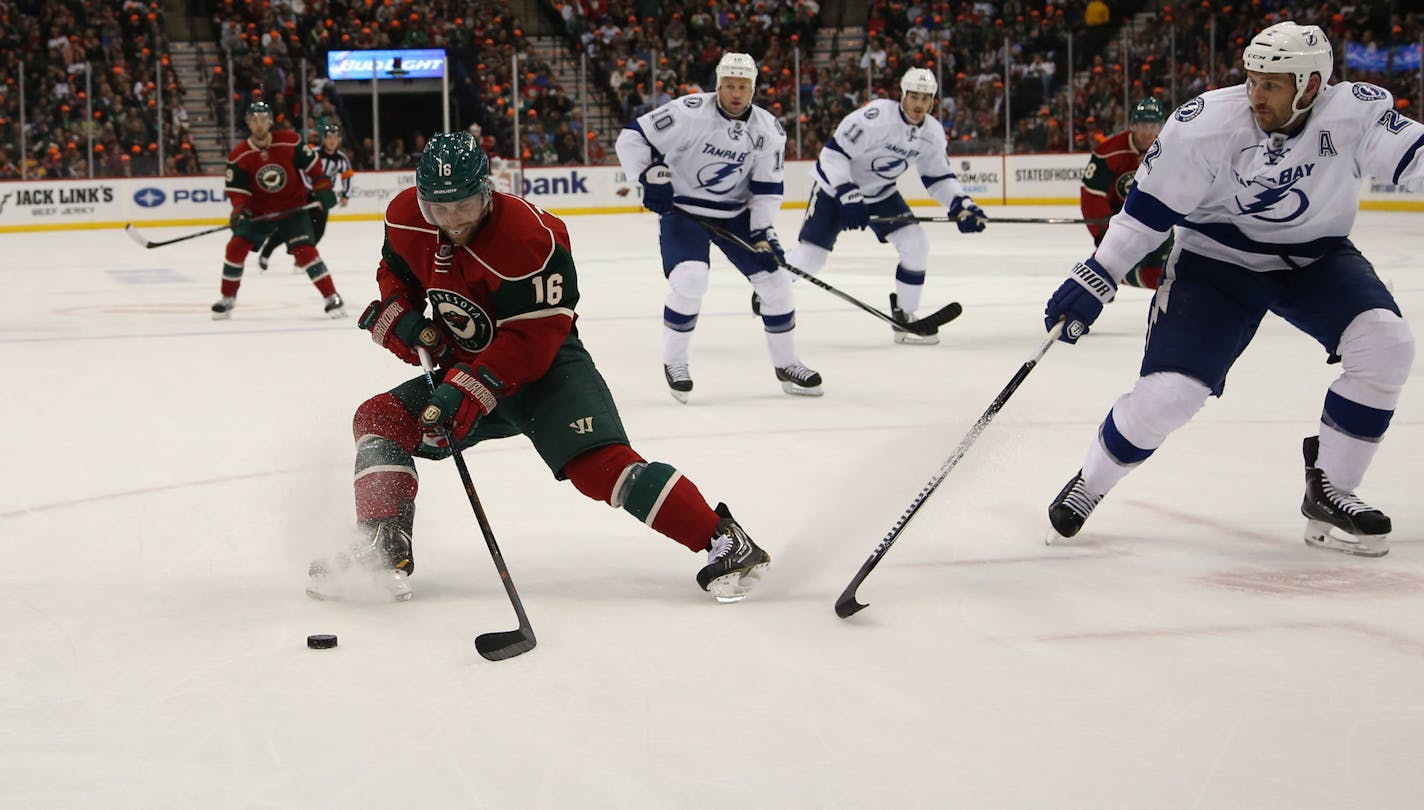 Wild's Jason Zucker made a spin move then scored the four goal for the Wild during the first period. ] (KYNDELL HARKNESS/STAR TRIBUNE) kyndell.harkness@startribune.com The Wild vs the Lighting at the Xcel Energy Center in St. Paul Min., Saturday, October 25, 2014.