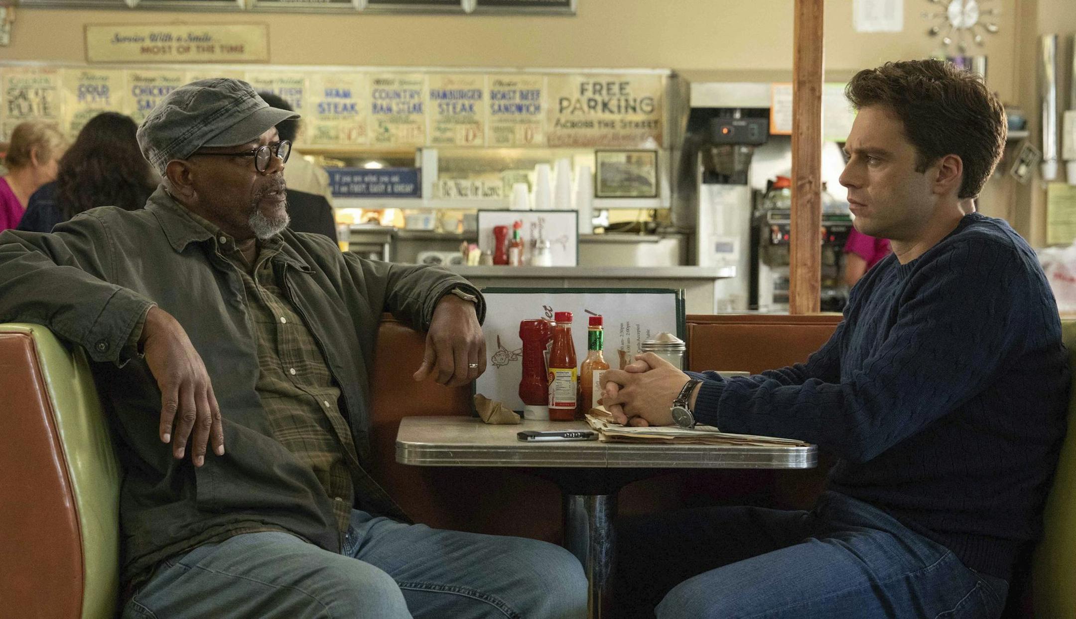 This image released by Roadside Attractions shows Samuel L. Jackson, left, and Sebastian Stan in a scene from "The Last Full Measure." (Jackson Lee Davis/Roadside Attractions via AP)