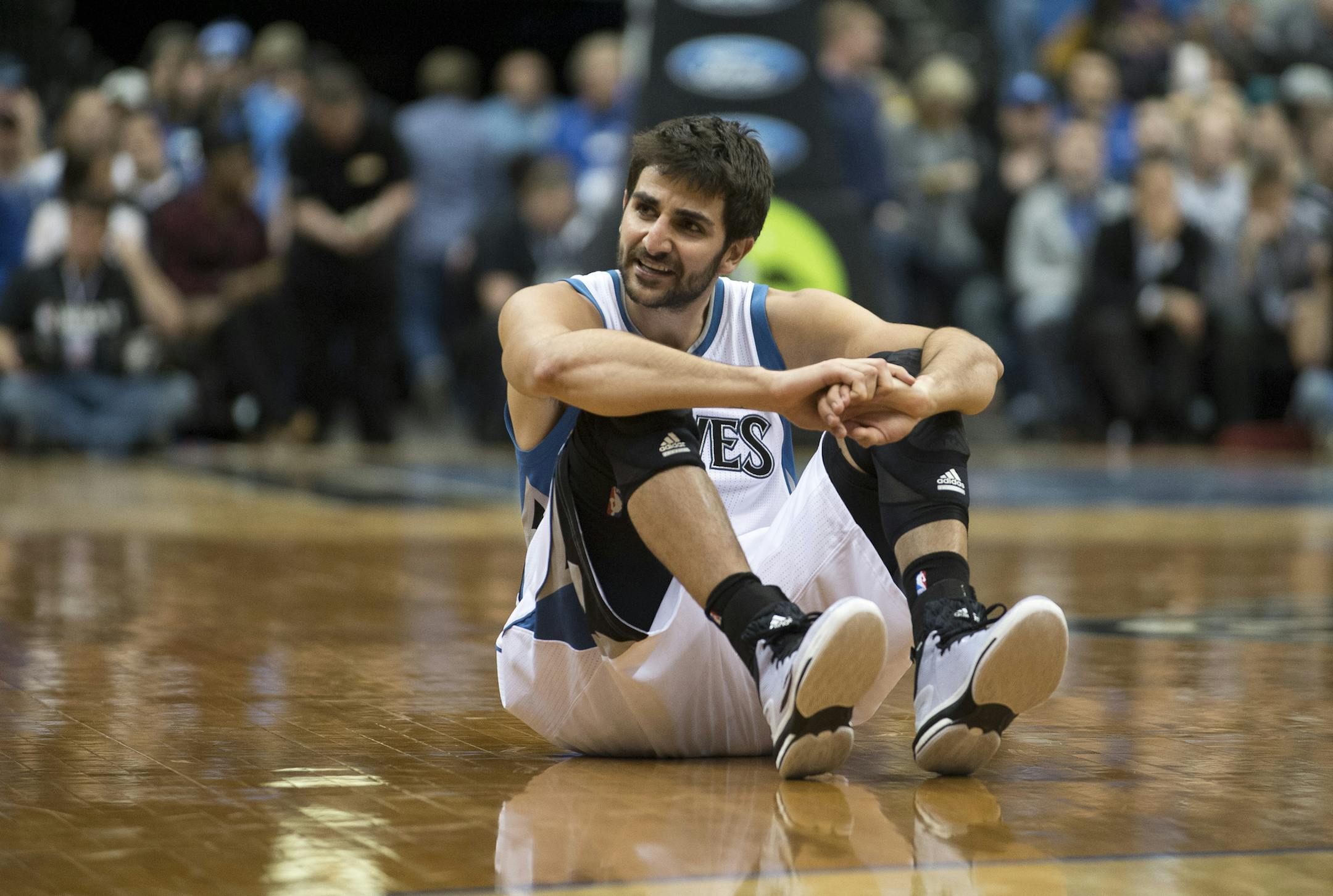 Minnesota Timberwolves guard Ricky Rubio (9) sits on the ground in frustration after being fouled on a shot but missing. ] (Aaron Lavinsky | StarTribune) The Phoenix Suns play the Minnesota Timberwolves on Friday , Feb. 20 2015, at Target Center