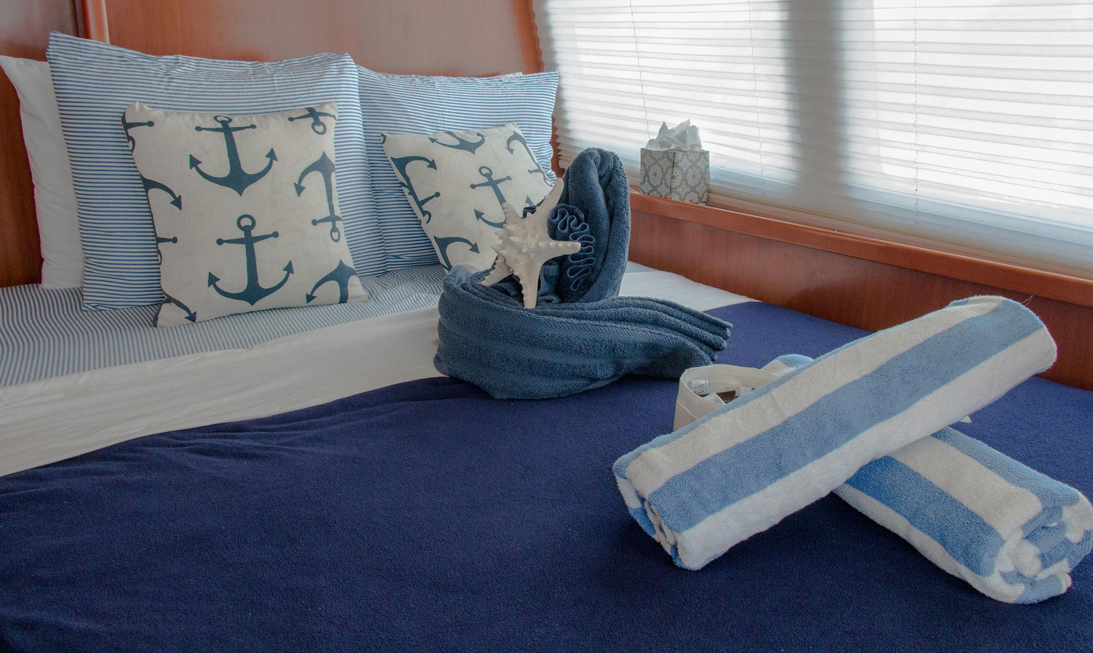 The nautical theme carried into our boat's stateroom, featuring a bed, private bathroom and several closets.(Hillary Richard/For the Chicago Tribune/TNS)