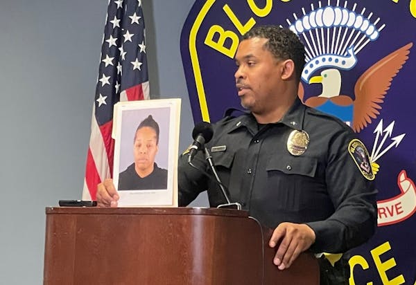 Bloomington Police Chief Booker Hodges showed a booking photo of a Erica McMillian, arrested in Golden Valley after police said she drove her son to G