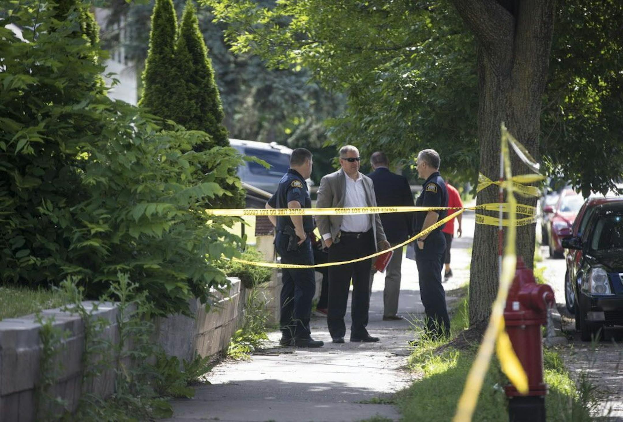 Police taped off the scene of a shooting on the 200 block of Maryland Avenue in St. Paul Monday.