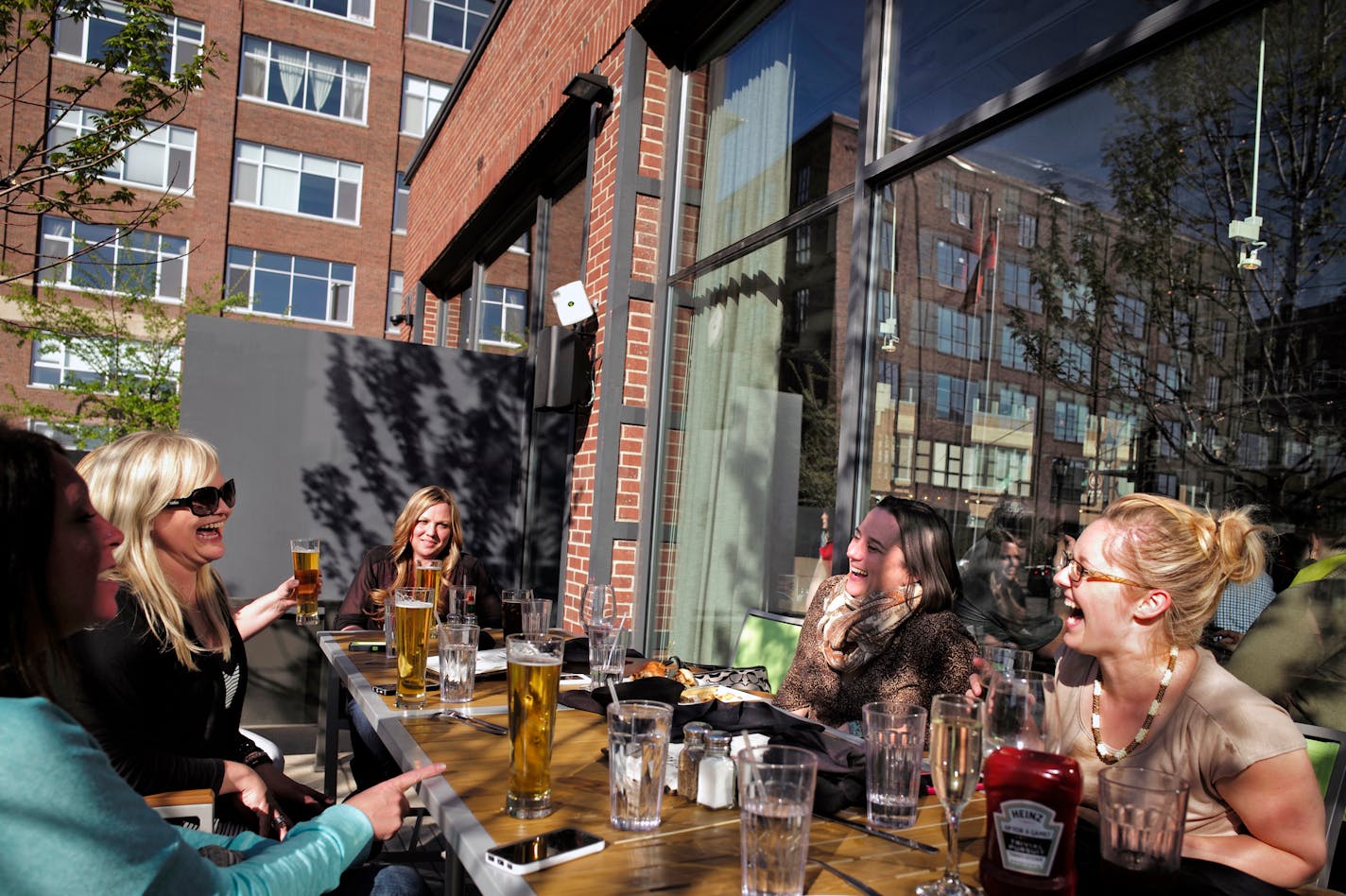 At the Freehouse Pub in the North Loop downtown Minneapolis, a group of friends including enjoyed happy hour.