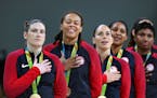 The USA women's basketball team savored the moment during the national anthem after its sixth consecutive gold medal win. Lynx player Lindsey Whalen, 