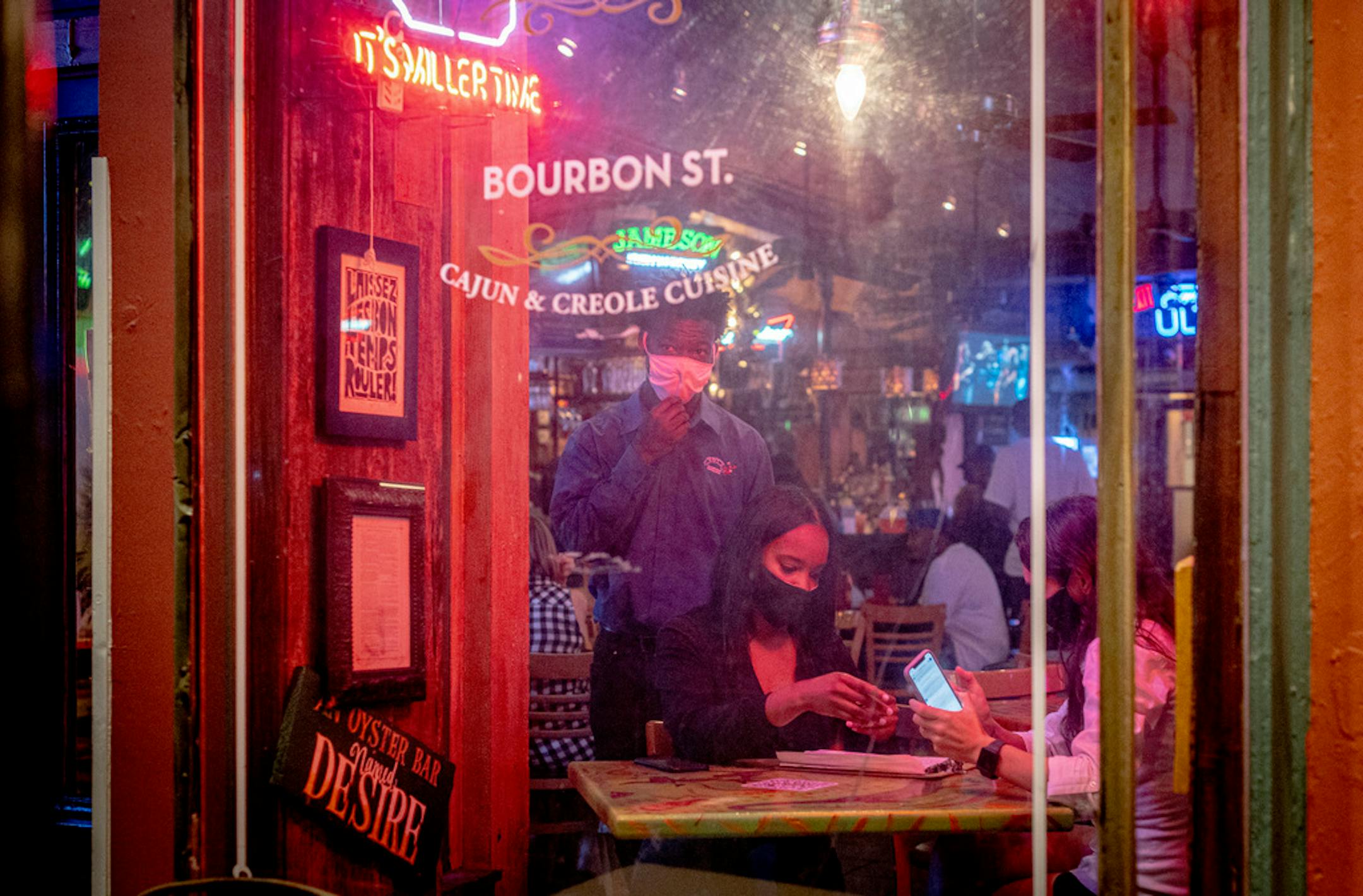 A Bourbon Street restaurant in New Orleans. Many people have said they plan to spend less on dining out in the future.