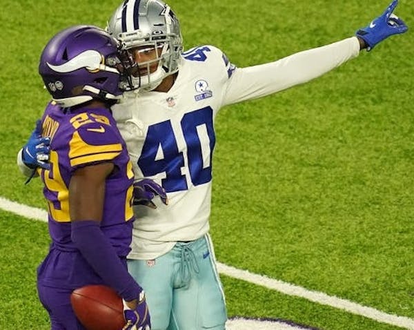 Cowboys safety Steven Parker taunted Vikings cornerback Kris Boyd after Boyd's penalty negated his fourth-down reception on a fake punt.