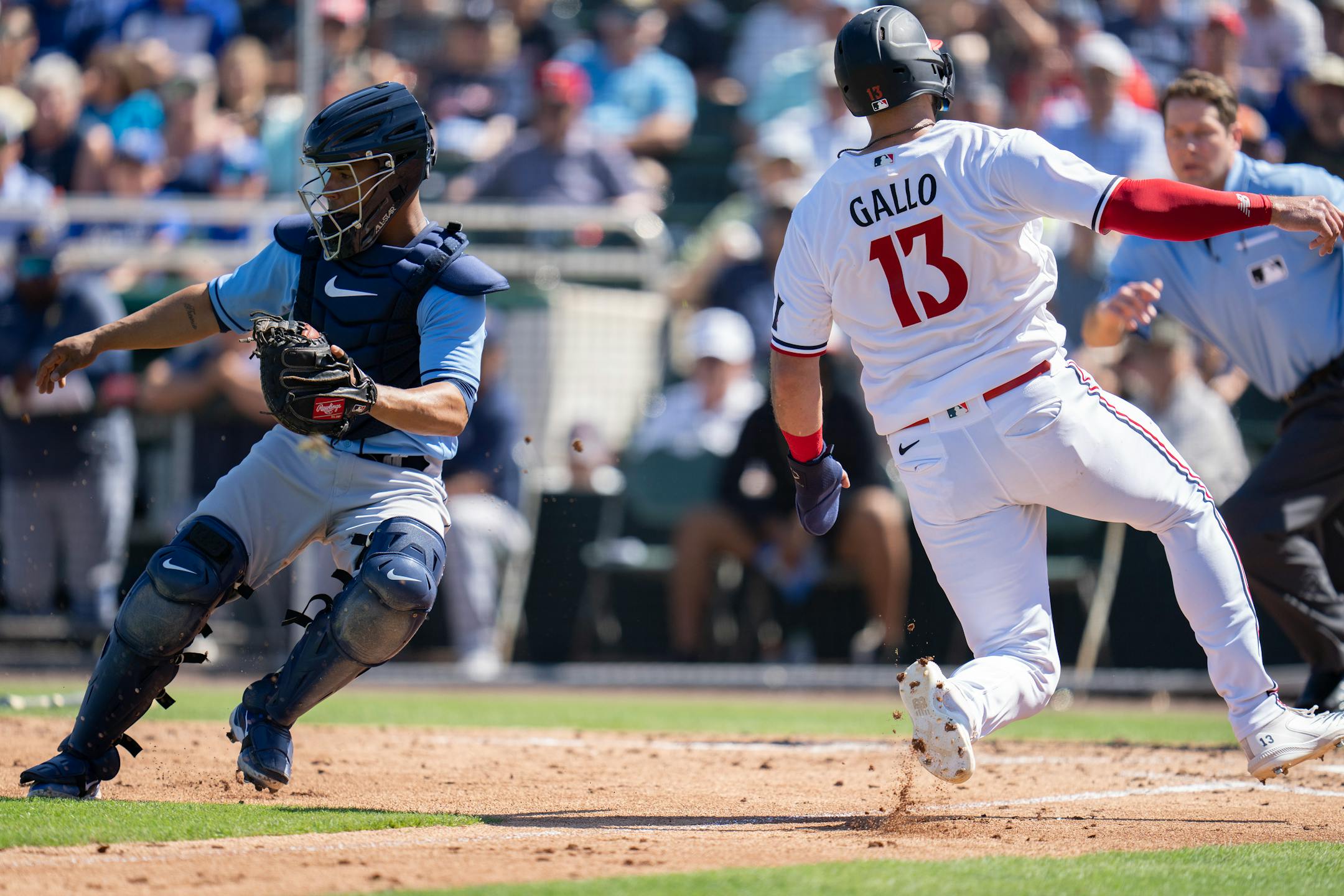 Minnesota Twins Joey Gallo scored from third base on a sacrifice fly over Tampa Bay Rays catcher Mejia Francisco.