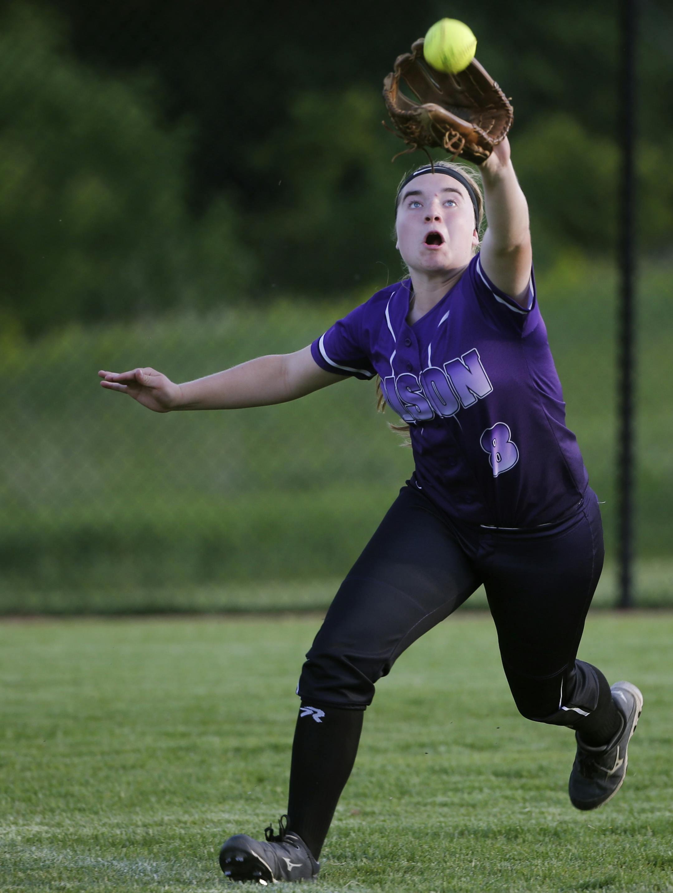 In a 6AAA fast pitch tournament game between Buffalo and Hopkins at Miller Park in Eden Prairie, Sarah Hudson(8) makes a running catch in the 9th inning.] Richard Tsong-Taatarii/rtsong-taatarii@startribune.com
