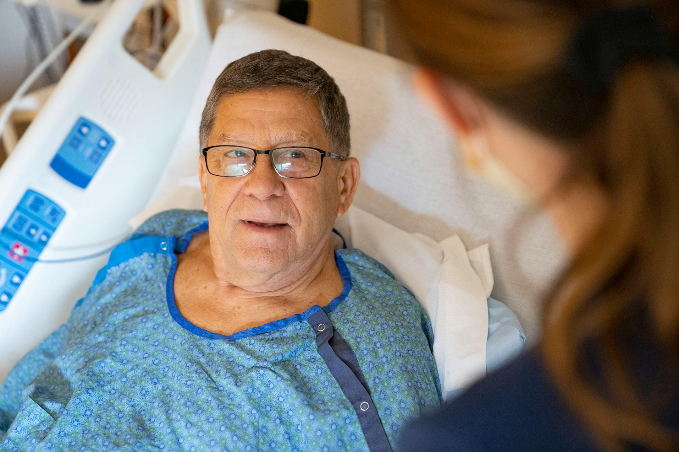 Clay Tutland receives an injection from Danika Dahle, RN, Thursday, March 24, 2022 at Maple Grove Hospital in Maple Grove, Minn. Tutland received a left knee replacement at the hospital and is recovering.