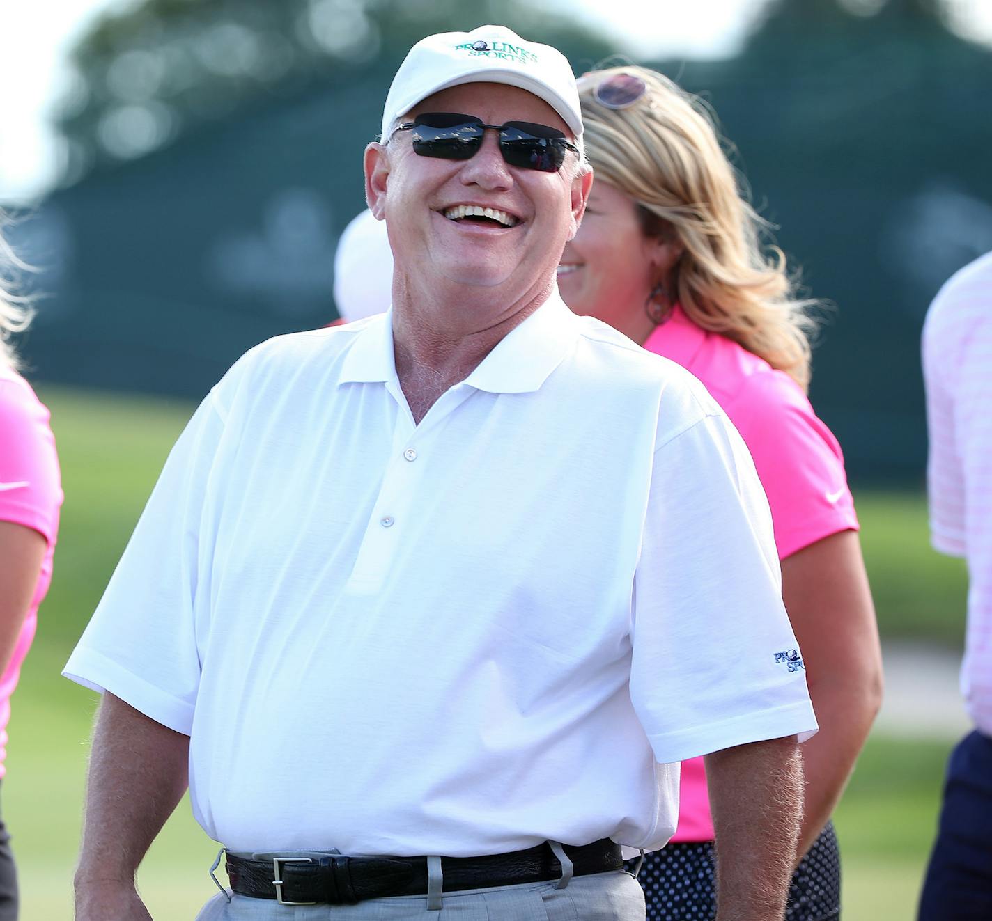 Hollis Cavner, founder and director 3M Championship golf tournament looked on, as Kenny Perry winner for this years tournament lifted his trophy at the TPC Twins Cities golf course August 2, 2015 in Blaine, MN. ] Jerry Holt/ Jerry.Holt@Startribune.com