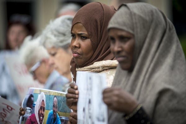 Ayan Farah, mother of Mohamed Abdihamid Farah, center, and Fadumo Hussein, mother of Guled Ali Omar, took part in a demonstration outside of the US Fe