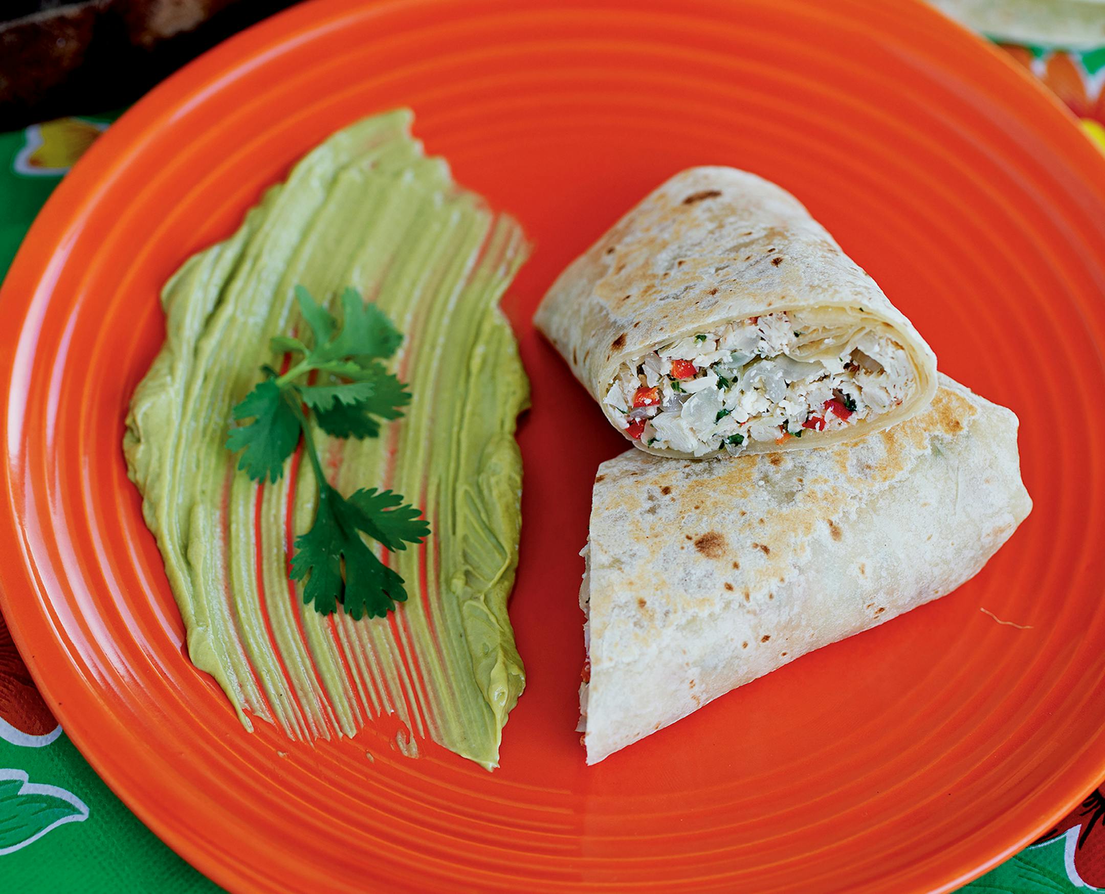 Crab Burritos with Pickled Chiles and Chipotle-Avocado Sauce from "Cali-Baja Cuisine" by Michael A. Gardiner (Rizzoli, 2023) Credit: Cintia Soto