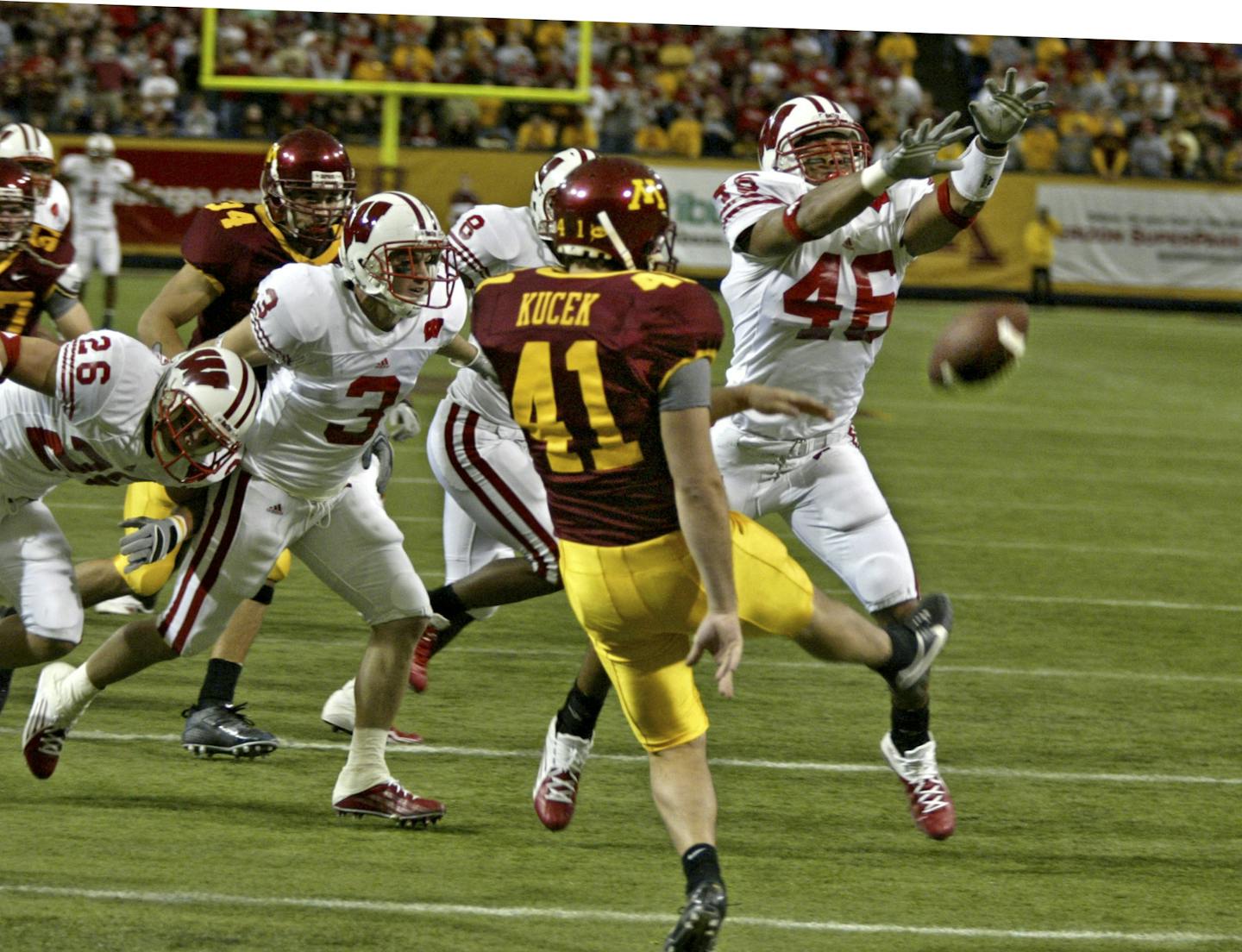 Gopher punter Justin Kucek has his punt blocked in the final minute of Minnesota's 2005 game against Wisconsin. The Badgers recovered the ball in the end zone and won the game.