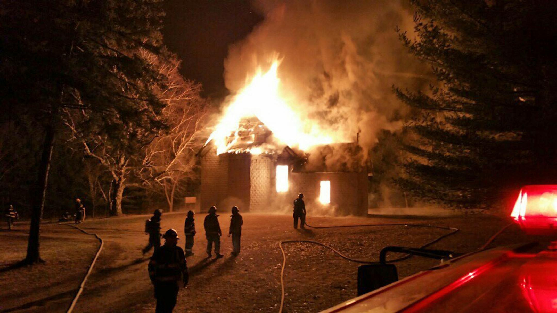 Firefighters from Randall Fire Department battled flames that engulfed the Darling Township church in Morrison County. Investigators believe the fire was intentionally set and are investigating it as arson. Mandatory credit: Nick Mielke - Special to the Star Tribune