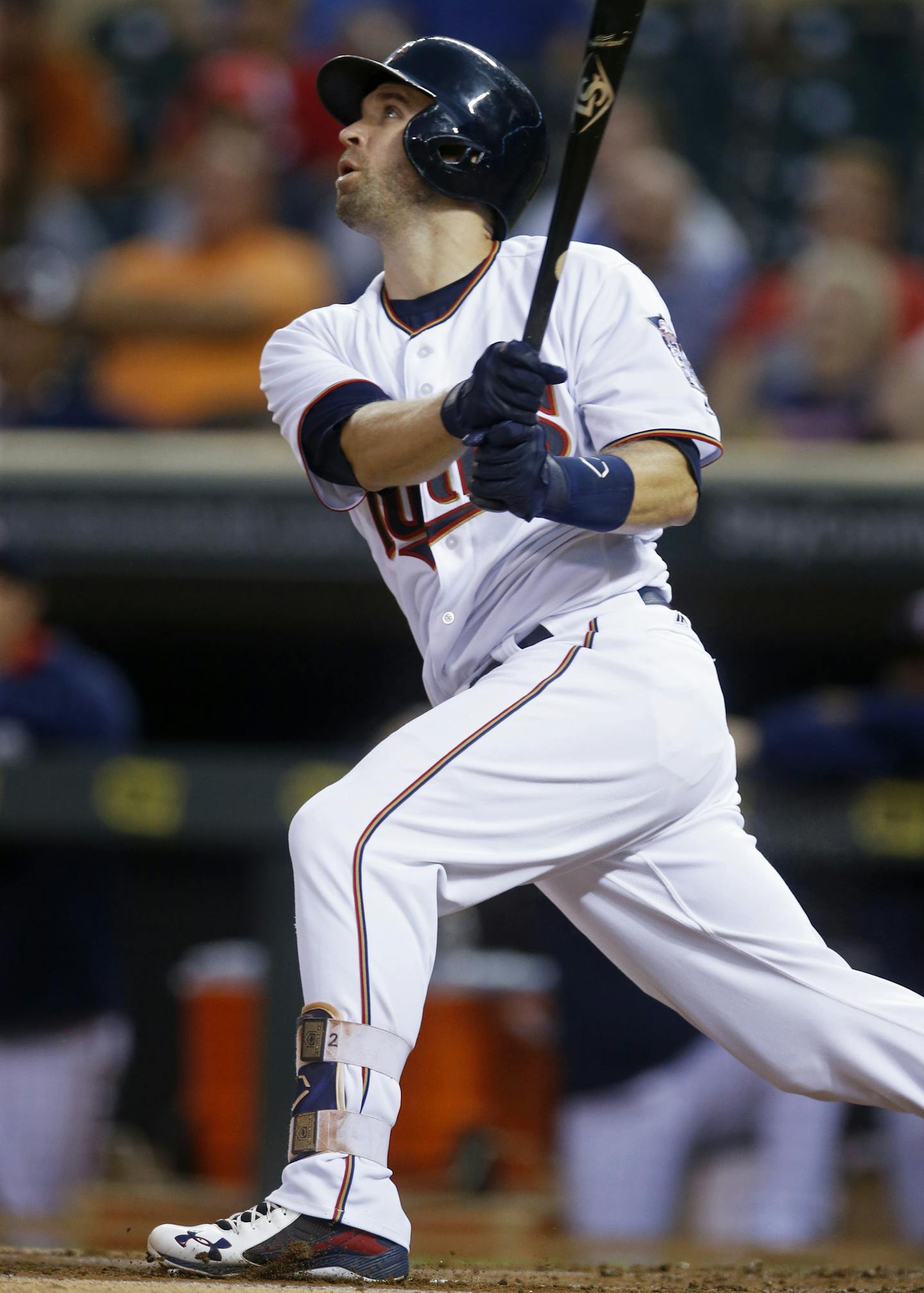 Minnesota Twins&#xed; Brian Dozier watches his leadoff home run off Kansas City Royals pitcher Dillon Gee in the first inning of a baseball game Tuesday, Sept. 6, 2016, in Minneapolis. (AP Photo/Jim Mone) ORG XMIT: MIN2016120421202626