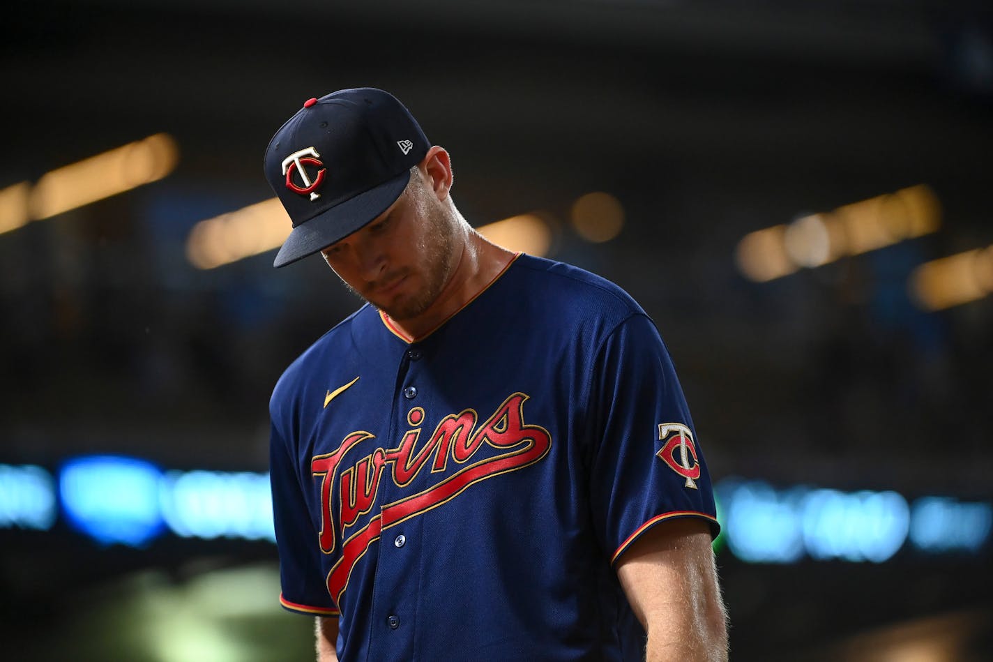 Minnesota Twins starting pitcher Bailey Ober (82) walked back to the dugout after the top of the sixth inning.