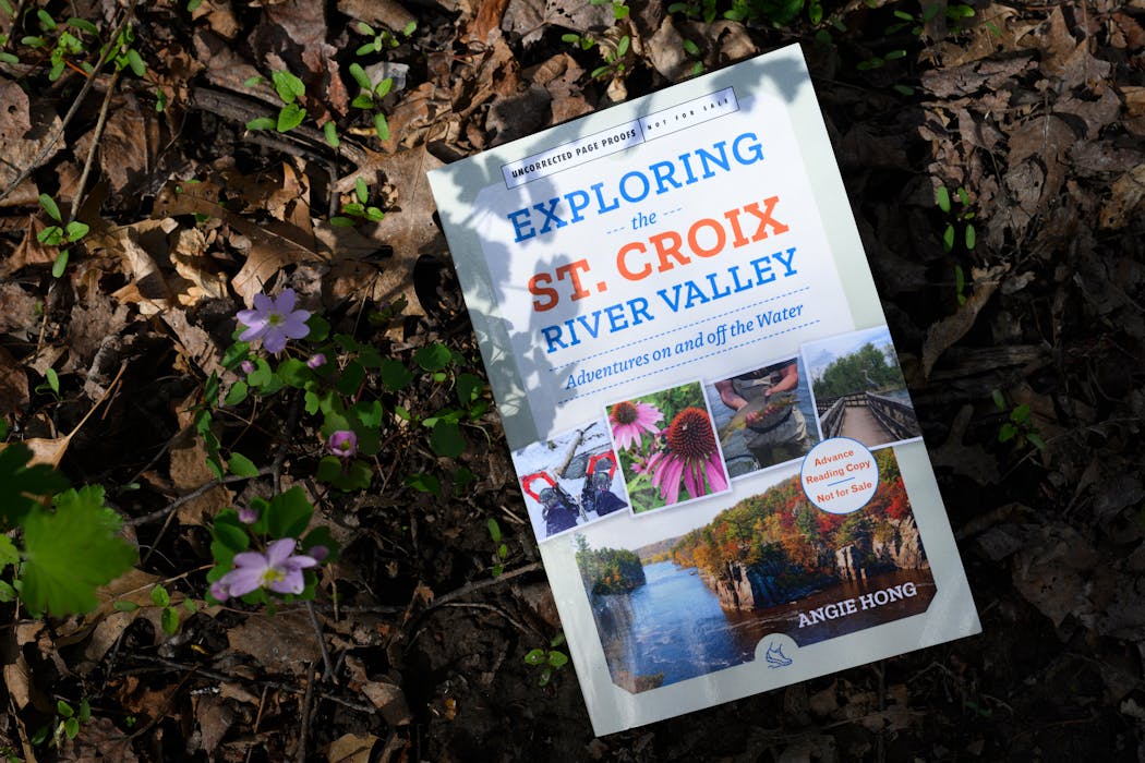 An advance copy of Angie Hong’s new book, “Exploring the St. Croix River Valley,” photographed at Sunfish Lake Park in Lake Elmo.