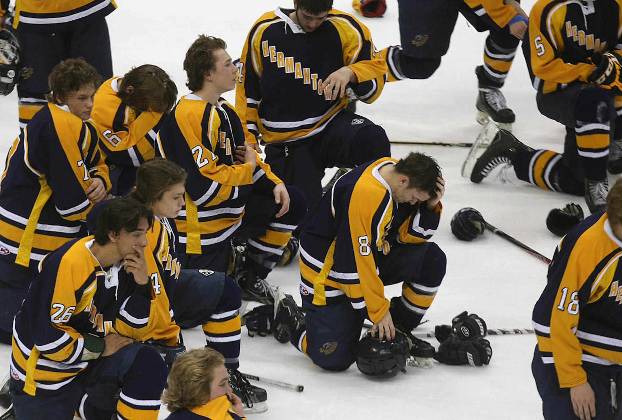 Hermantown players waited for the awards ceremony.