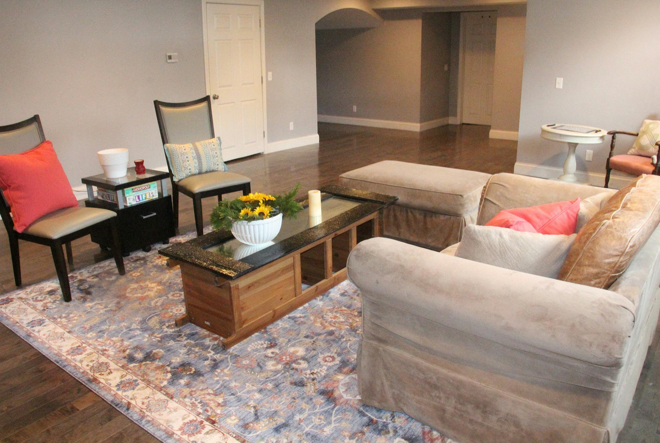 After: A large area rug helps anchor and define the space. (Design Recipes/TNS) ORG XMIT: 1314364