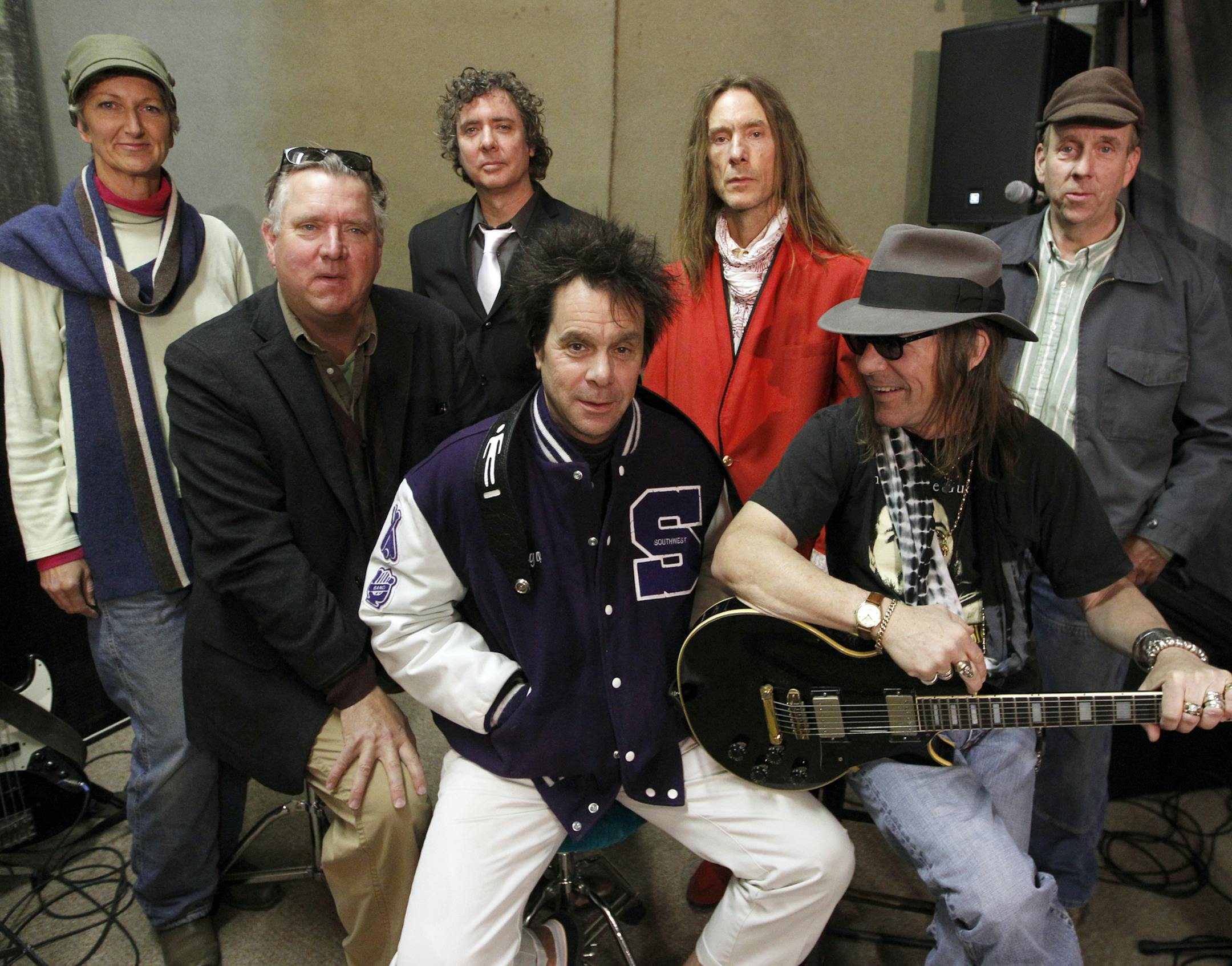 The Suburbs, from left, Rochelle Becker, Chan Poling, Michael Halliday, tie, Hugo Klaers, letter jacket, Steve Brantseg, red jacket, John ‚ÄúBeej‚Äù Chaney, Shades and Max Ray, back were photographed during a rehearsal last week in North Minneapolis. He and the band were getting ready for another round of Suburbs reunions, and he‚Äôs back in the studio recordings for the first time in years. [ TOM WALLACE ‚Ä¢ twallace@startribun