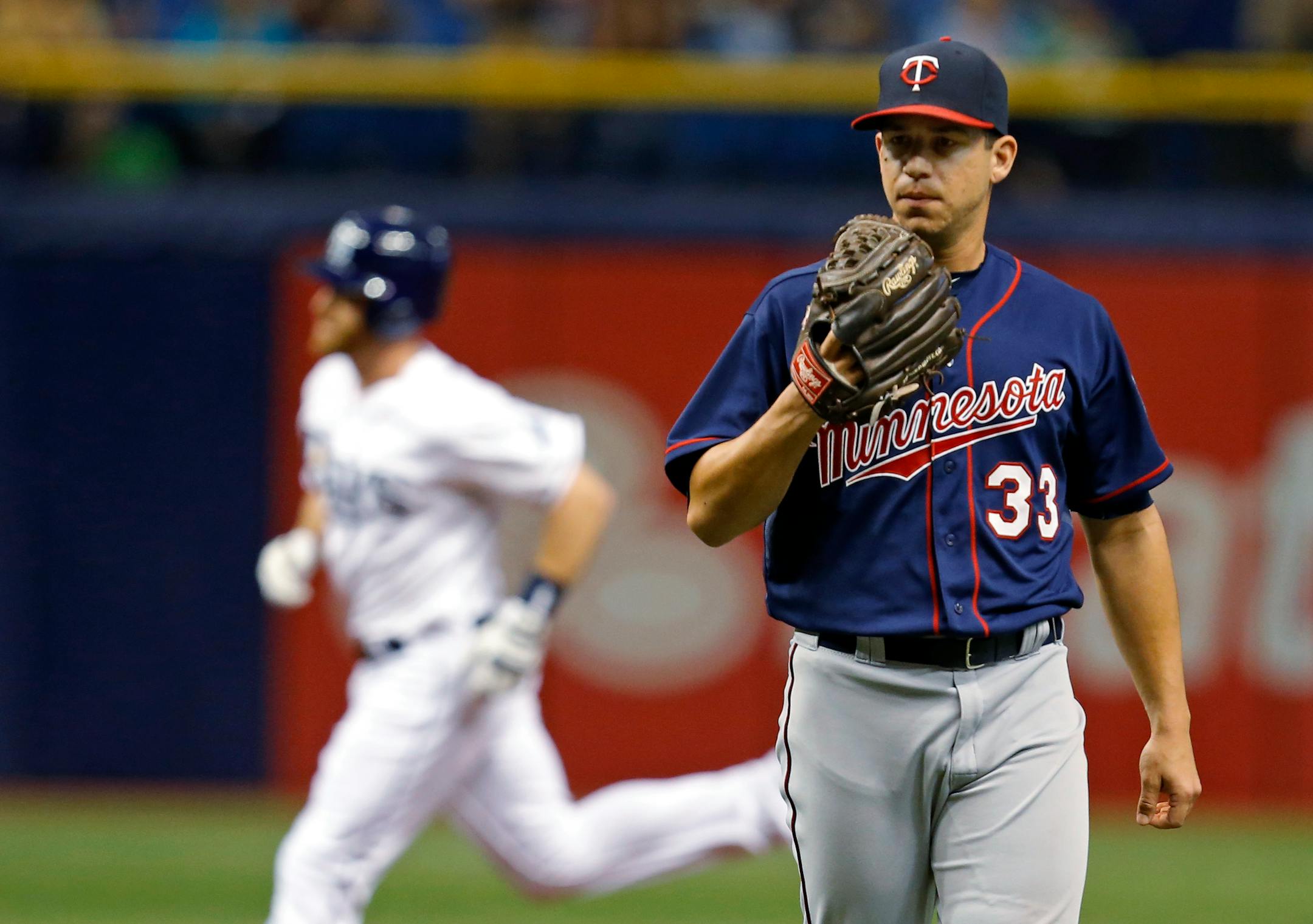 Logan Forsythe rounds the bases after hitting a home run off former Twins pitcher Tommy Milone in 2015.