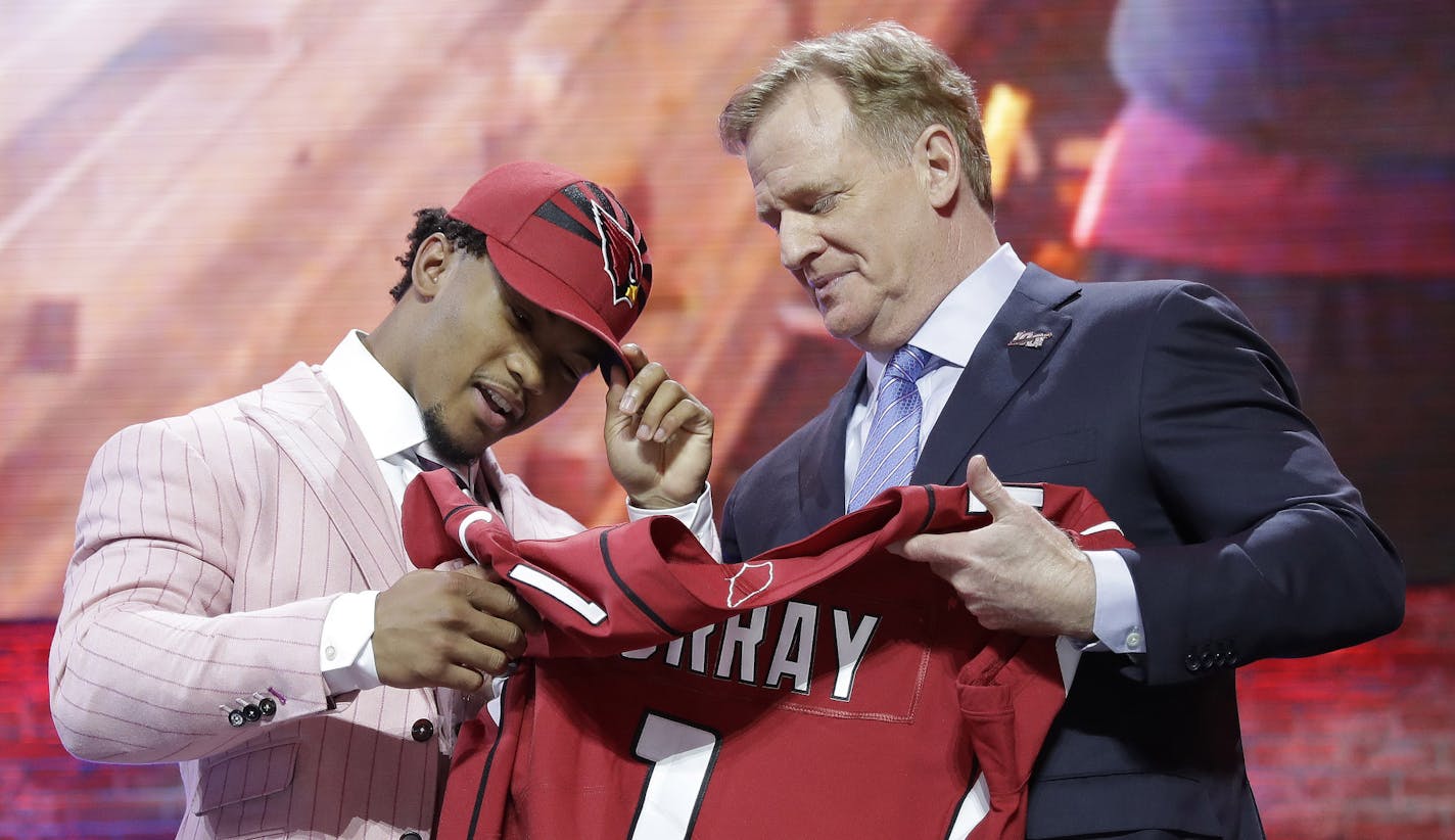 Oklahoma quarterback Kyler Murray poses with NFL Commissioner Roger Goodell after the Arizona Cardinals selected Murray in the first round at the NFL football draft, Thursday, April 25, 2019, in Nashville, Tenn. (AP Photo/Mark Humphrey)