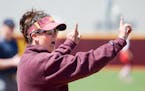 Minnesota head coach Jamie Trachsel directed her team during the first game of Wednesday's double header.