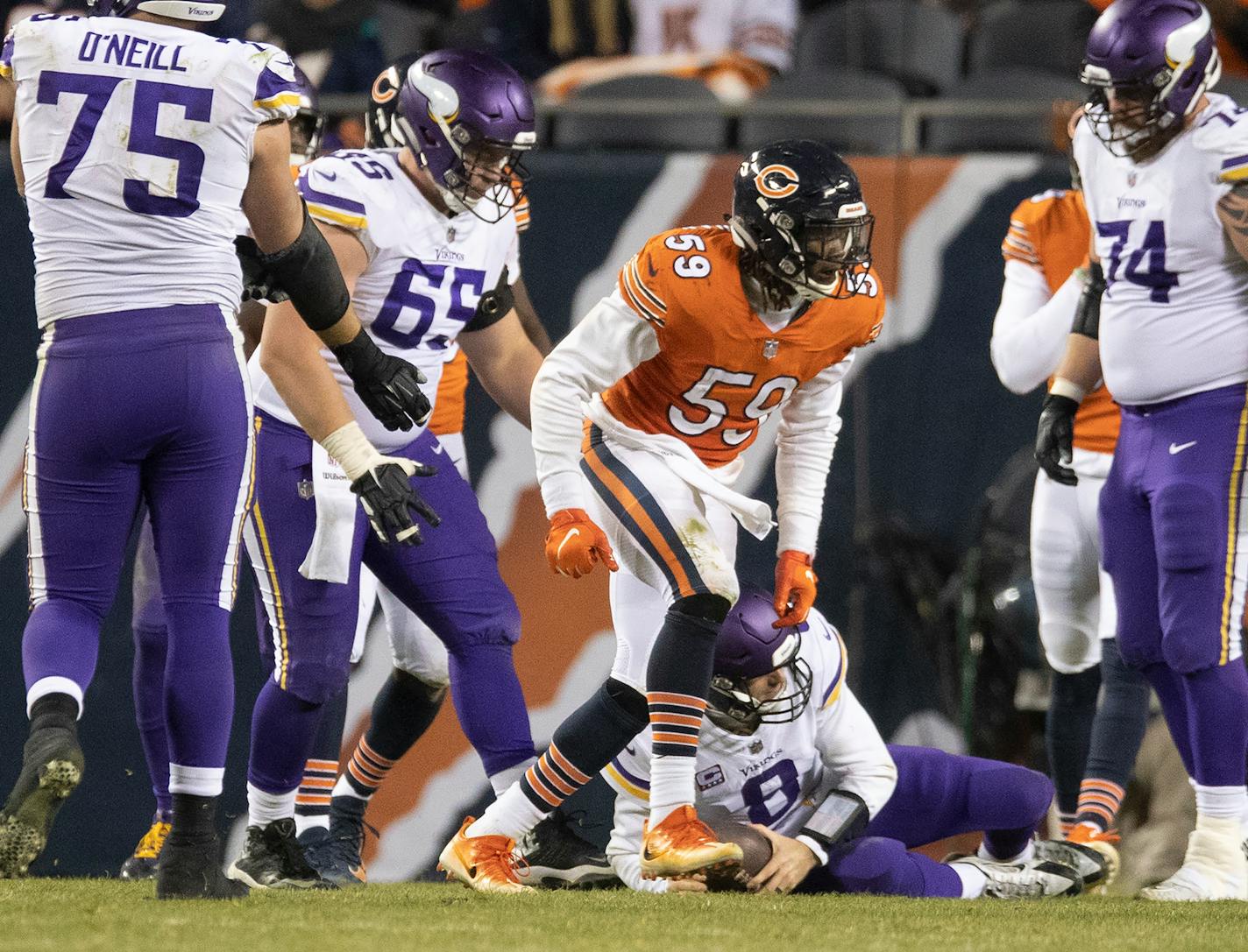 Bears inside linebacker Danny Trevathan (59) stopped Vikings quarterback Kirk Cousins (8) short of the goal line late in the fourth quarter at Soldier Field on Sunday.