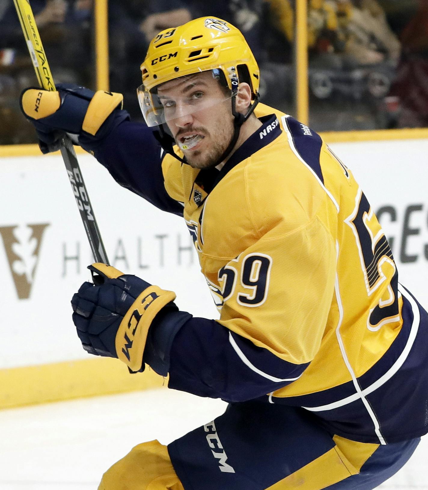 Nashville Predators defenseman Roman Josi (59), of Switzerland, celebrates after scoring a goal against Washington Capitals goalie Philipp Grubauer, upper right, of Germany, and left wing Daniel Winnik (26) during the second period of an NHL hockey game Saturday, Feb. 25, 2017, in Nashville, Tenn. (AP Photo/Mark Humphrey) ORG XMIT: TNMH111