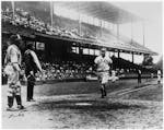 Josh Gibson scores against the Newark Eagles at Griffith Stadium in 1942.
