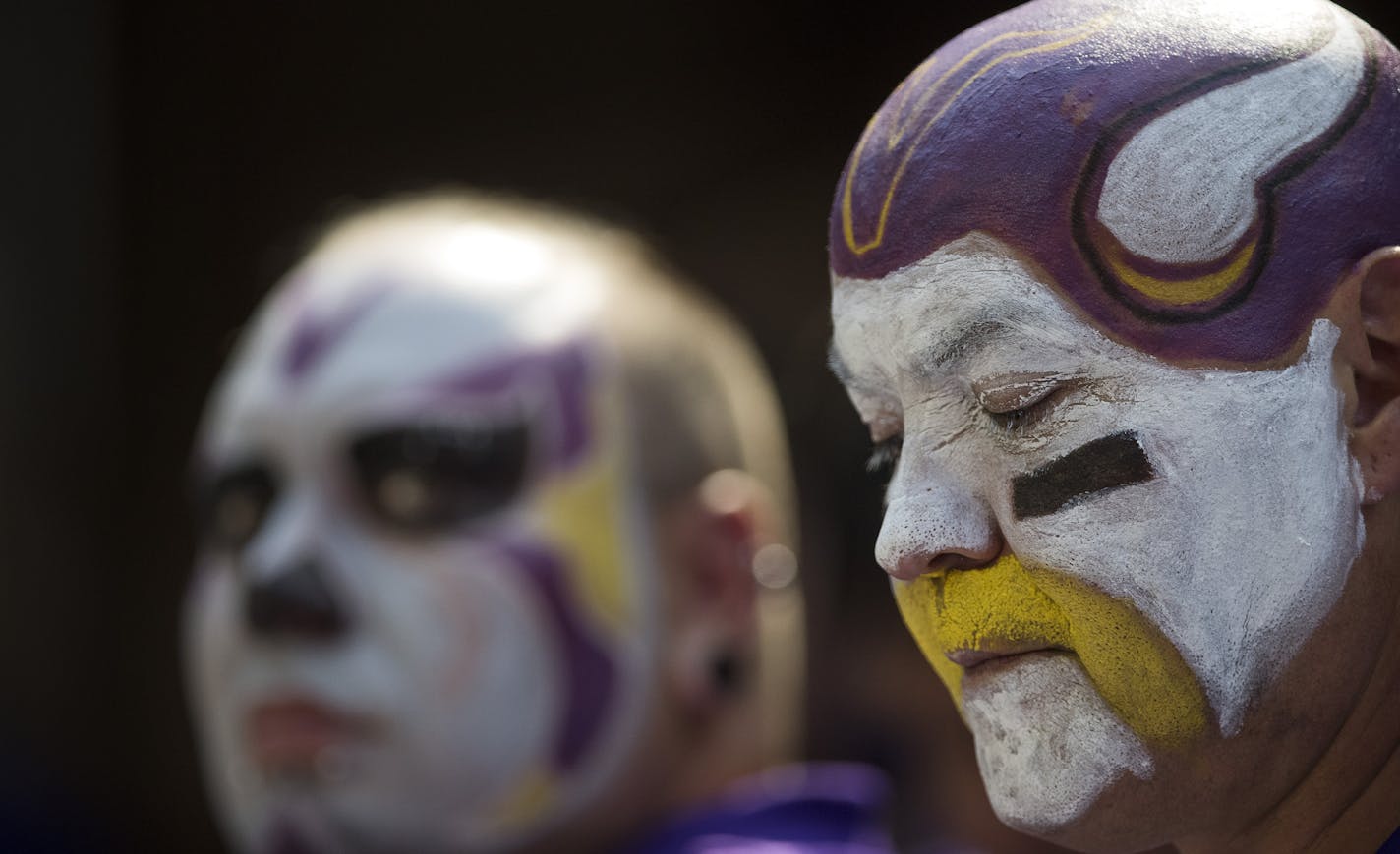 Vikings fans Dan Thomas left and Tony Pike suffered through the second half of the Vikings-Bills game.