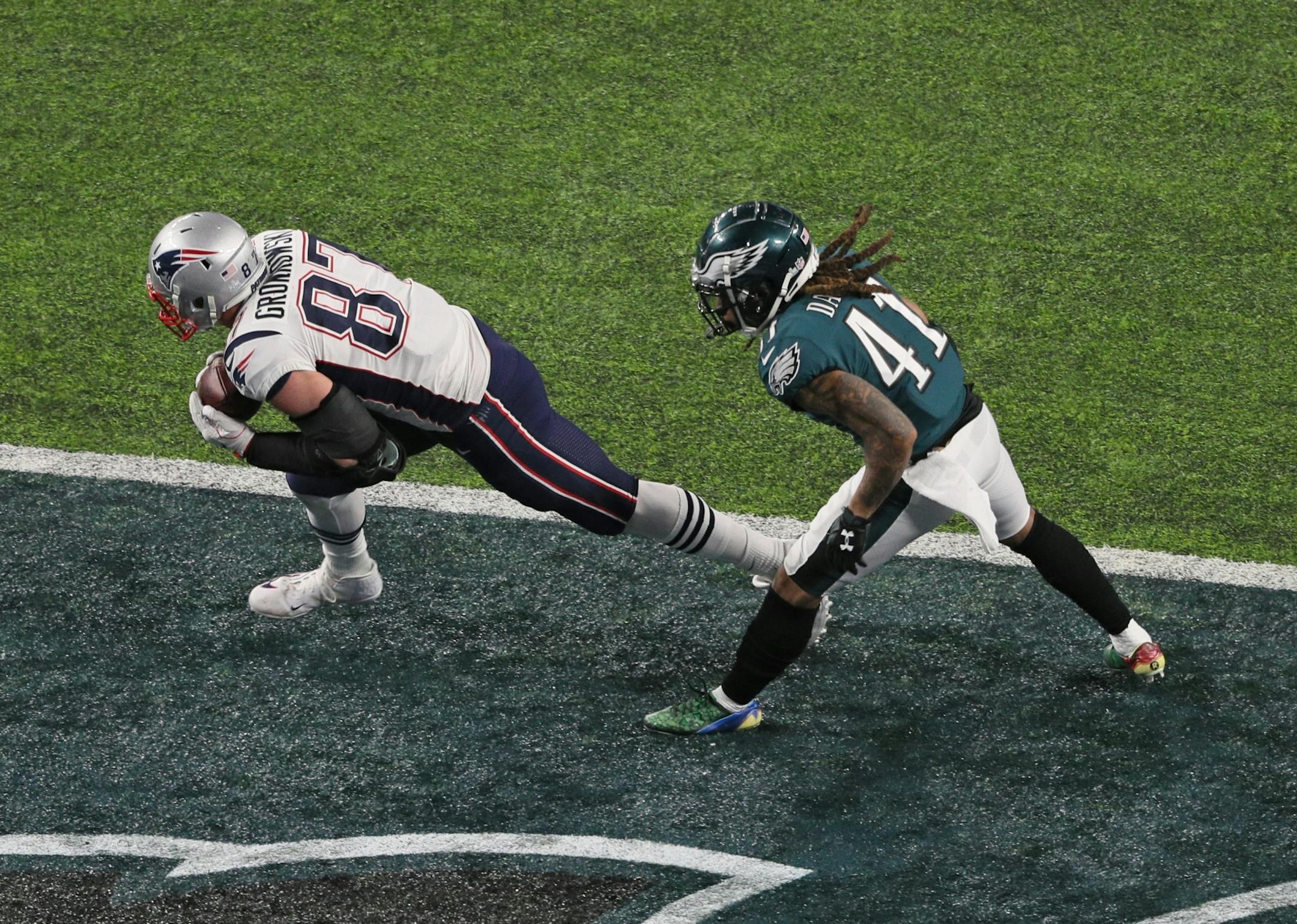 New England Patriots tight end Rob Gronkowski (87) snagged a 5-yard touchdown pass from Tom Brady on the opening drive of the third quarter of Super Bowl LII as Philadelphia Eagles cornerback Ronald Darby (41) defended. third qtr?