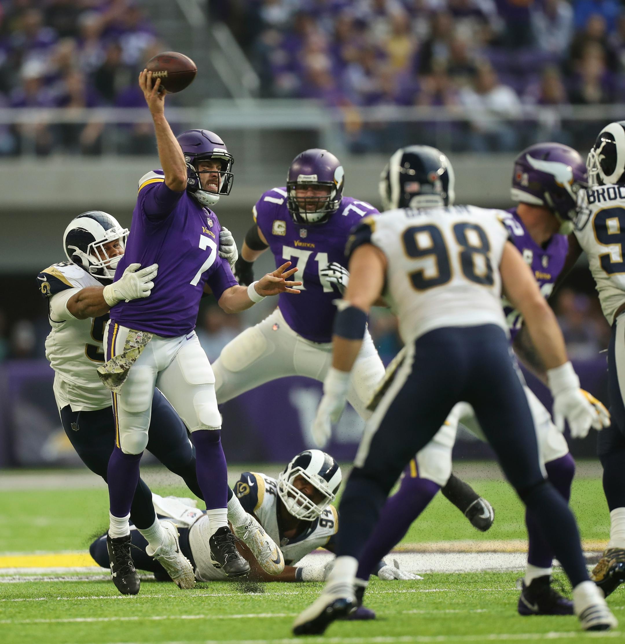 Minnesota Vikings quarterback Case Keenum (7) passed while under pressure from Los Angeles Rams defensive end Aaron Donald (99) in the second quarter. ] JEFF WHEELER � jeff.wheeler@startribune.com The Minnesota Vikings faced the Los Angeles Rams in an NFL football game Sunday afternoon, November 19, 2017 at U.S. Bank Stadium in Minneapolis.