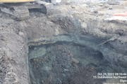 Gray petroleum-contaminated soil is excavated at the site of a Cenex gas station leak on Oct. 25, 2022.