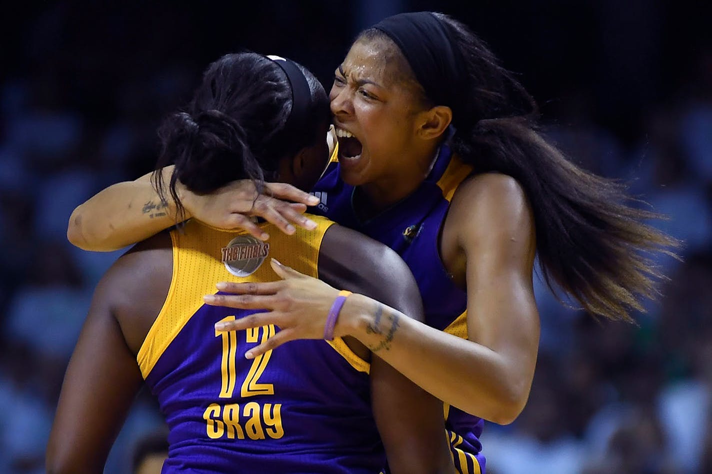 Los Angeles Sparks forward Candace Parker (3) celebrated with guard Chelsea Gray (12) after a traveling violation was called against Minnesota Lynx forward Maya Moore (23) with :01 left on the clock, sealing a victory for Los Angeles.