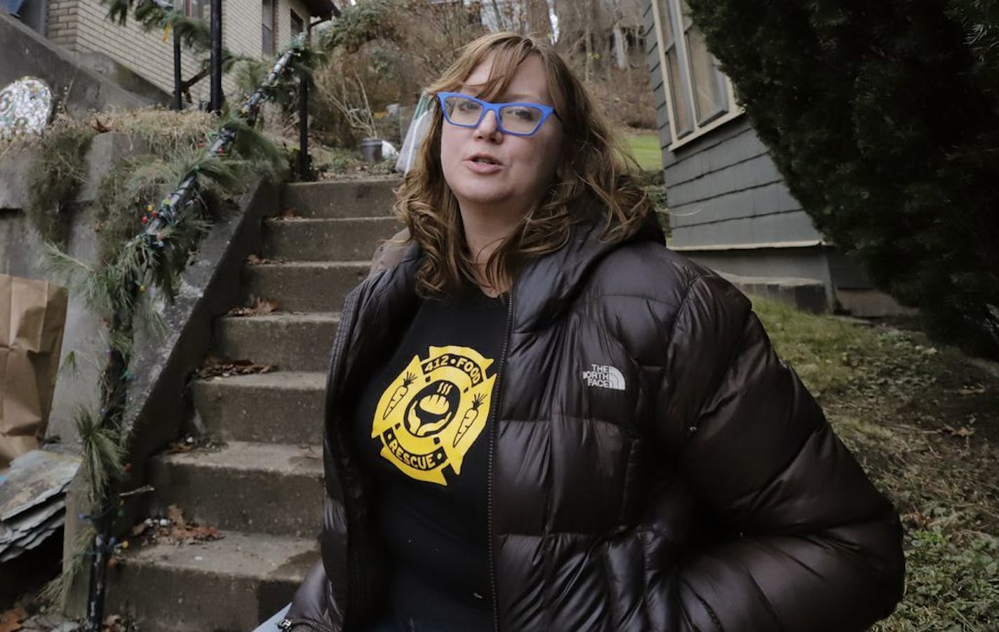 Rebecca Macleand, a housing program specialist for the U.S. Department of Housing and Urban Development in Pittsburgh, stands outside her home in Pittsburgh Thursday, Jan. 3, 2019. Maclean, 41, has been on furlough since Dec. 21. Her family's financial outlook isn't dire yet since her husband, Dan Thompson, owns a knife-making business and works as an elected constable. But the couple recently sat down to prioritize which bills must be paid on time and which can be paid late without dinging thei